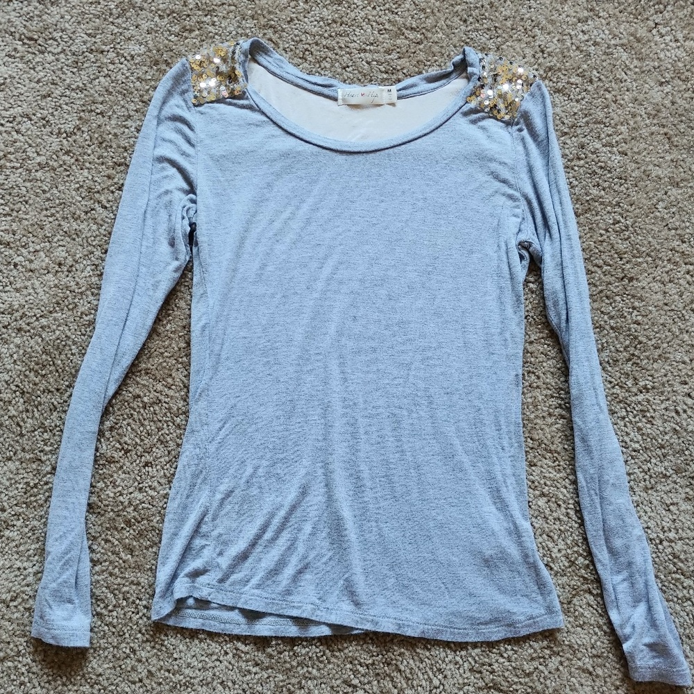Long sleeve shirt with sequin accent